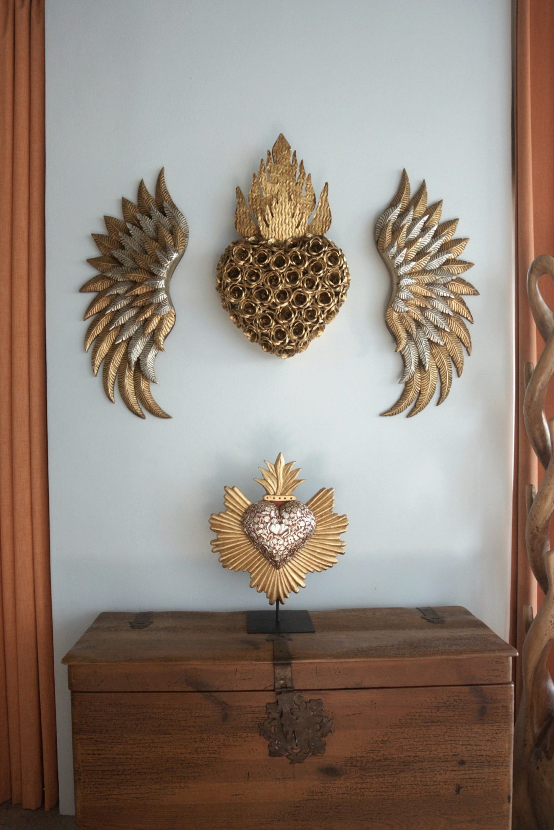 Gilded decorative detail on a timber wall